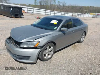 2013 Volkswagen Passat SE w/Sunroof with VIN 1VWBH7A35DC118355, listed as a IAAI auction lot 41835236 with 228,358 mi miles. Bid and sale history available at carsss.com. Image 2.