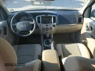 2006 Mazda Tribute S with VIN 4F2YZ04106KM28191, listed as a Copart auction lot 83150994 with 126,536 mi miles and Clean Title. Bid and sale history available at DreamBid. Image 8.