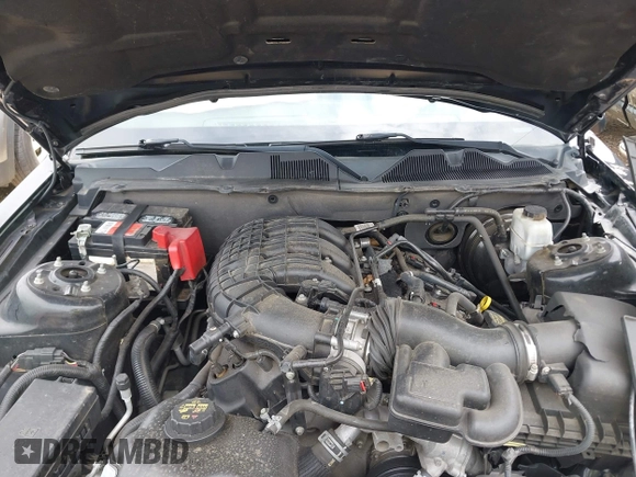 2012 Ford Mustang Premium with VIN 1ZVBP8AM4C5285696, listed as a IAAI auction lot 42465296 with 143,387 mi miles and . Bid and sale history available at DreamBid. Image 10.