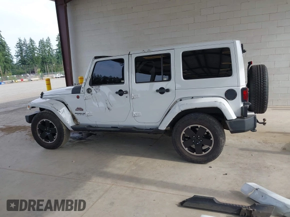 2012 Jeep Wrangler Unlimited Sahara with VIN 1C4BJWEG7CL275883, listed as a IAAI auction lot 42510764 with 149,531 mi miles and . Bid and sale history available at DreamBid. Image 15.
