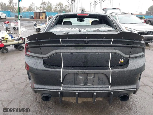 2022 Dodge Charger Scat Pack Widebody with VIN 2C3CDXGJ4NH159524, listed as a IAAI auction lot 41506983 with 66,750 mi miles. Bid and sale history available at carsss.com. Image 17.