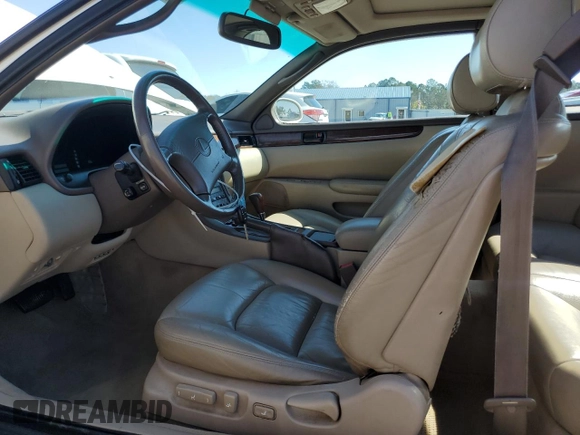 1998 Lexus SC 300 z VIN JT8CD32Z5W1004027, wystawiony jako Copart lot #48164775 z przebiegiem 132 030 mil mil oraz Szkody całkowita. Historia ofert i sprzedaży dostępna na DreamBid. Obrazek 7.