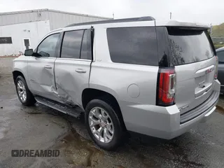 2015 GMC Yukon SLT with VIN 1GKS2BKC0FR676107, listed as a IAAI auction lot 41962929 with 132,389 mi miles. Bid and sale history available at carsss.com. Image 3.