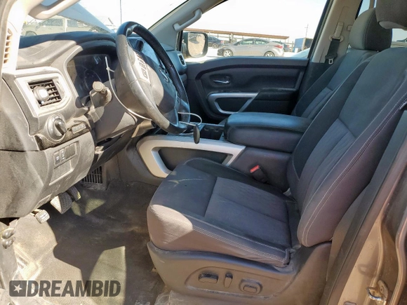 2021 Nissan Titan Pro-4X with VIN 1N6AA1ED9MN521808, listed as a Copart auction lot 58806585 with 108,808 mi miles and Salvage title. Bid and sale history available at DreamBid. Image 7.