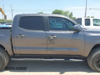 2021 Toyota Tacoma SR with VIN 3TYAX5GN3MT015565, listed as a IAAI auction lot 42241436 with 46,921 mi miles and . Bid and sale history available at DreamBid. Image 13.