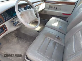 1995 Cadillac Concours z VIN 1G6KF52YXSU302434, wystawiony jako IAAI lot #42231281 z przebiegiem 153 236 mil mil oraz . Historia ofert i sprzedaży dostępna na DreamBid. Obrazek 14.