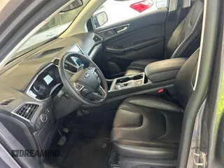 2021 Ford Edge Titanium z VIN 2FMPK3K97MBA51131, wystawiony jako IAAI lot #42529673 z przebiegiem 92 302 mil mil oraz . Historia ofert i sprzedaży dostępna na DreamBid. Obrazek 3.