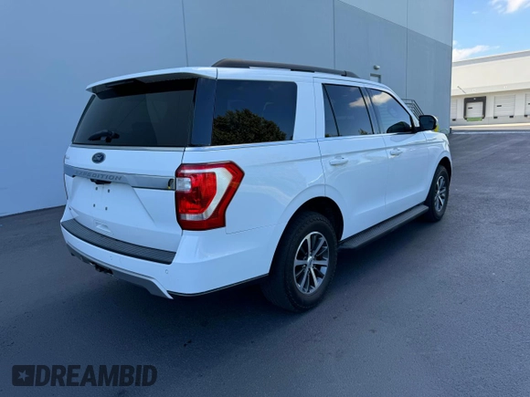 2019 Ford Expedition XLT with VIN 1FMJU1HT0KEA72881, listed as a Copart auction lot 82061434 with 79,109 mi miles and Salvage Title. Bid and sale history available at carsss.com. Image 4.