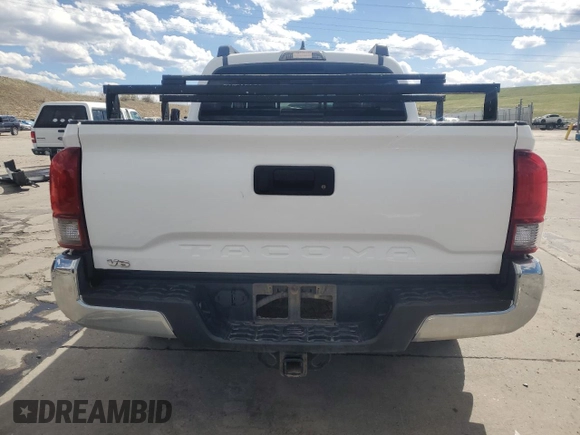 2018 Toyota Tacoma SR with VIN 5TFCZ5AN3JX128204, listed as a Copart auction lot 53970865 with 76,986 mi miles and Salvage Title. Bid and sale history available at DreamBid. Image 6.