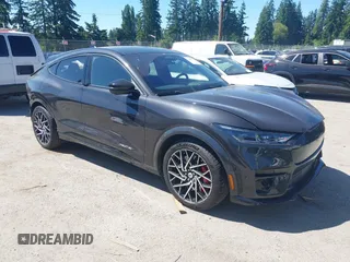 2022 Ford Mustang Mach-E GT z VIN 3FMTK4SX0NMA02257, wystawiony jako IAAI lot #42455019 z przebiegiem 21 889 mil mil oraz . Historia ofert i sprzedaży dostępna na DreamBid. Obrazek 1.