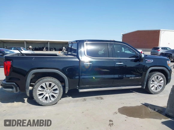 2020 GMC Sierra 1500 Denali with VIN 1GTU9FEL6LZ173499, listed as a IAAI auction lot 41856799 with 77,723 mi miles and . Bid and sale history available at DreamBid. Image 13.