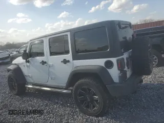 2016 Jeep Wrangler Unlimited Rubicon with VIN 1C4HJWFG4GL121906, listed as a Copart auction lot 48995385 with 96,632 mi miles and Salvage Title. Bid and sale history available at carsss.com. Image 2.