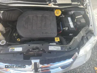 2019 Dodge Grand Caravan SE z VIN 2C4RDGBG6KR809509, wystawiony jako Copart lot #82650825 z przebiegiem 137 290 mil mil oraz Szkoda całkowita • Salvage title. Historia ofert i sprzedaży dostępna na DreamBid. Obrazek 16.