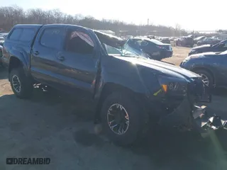2011 Toyota Tacoma with VIN 3TMLU4EN4BM058738, listed as a IAAI auction lot 41646897 with 117,817 mi miles. Bid and sale history available at carsss.com. Image 1.