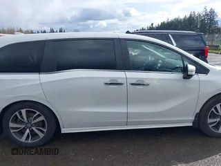 2021 Honda Odyssey Touring with VIN 5FNRL6H87MB015310, listed as a IAAI auction lot 41916339 with 58,808 mi miles. Bid and sale history available at carsss.com. Image 14.