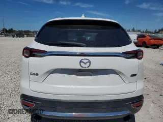 2016 Mazda CX-9 Grand Touring with VIN JM3TCADY9G0123193, listed as a Copart auction lot 50123825 with 65,588 mi miles and Salvage Title. Bid and sale history available at DreamBid. Image 6.