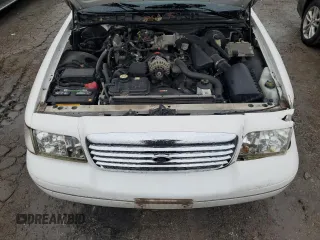 2005 Ford Crown Victoria LX z VIN 2FAFP74W95X166593, wystawiony jako Copart lot #80544294 z przebiegiem 178 591 mil mil oraz Czysty tytuł • Clean title. Historia ofert i sprzedaży dostępna na DreamBid. Obrazek 11.