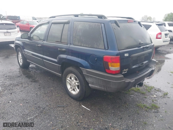 2002 Jeep Grand Cherokee Laredo with VIN 1J4GW48S22C244433, listed as a IAAI auction lot 41892912 with 256,393 mi miles. Bid and sale history available at carsss.com. Image 3.