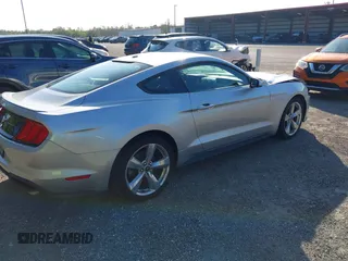 2019 Ford Mustang EcoBoost with VIN 1FA6P8TH9K5173906, listed as a IAAI auction lot 41343490 with 57,269 mi miles and . Bid and sale history available at carsss.com. Image 4.
