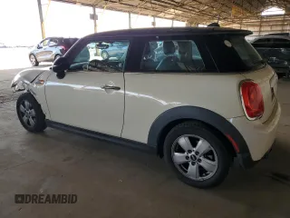 2014 MINI Hardtop with VIN WMWXM5C50ET933486, listed as a Copart auction lot 50823865 with 98,296 mi miles and Salvage Title. Bid and sale history available at DreamBid. Image 2.
