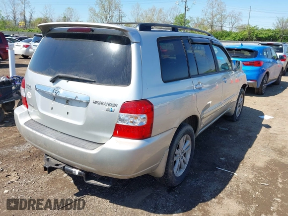 2006 Toyota Highlander Hybrid with VIN JTEEW21A560019431, listed as a IAAI auction lot 42112205 with 240,527 mi miles. Bid and sale history available at carsss.com. Image 4.