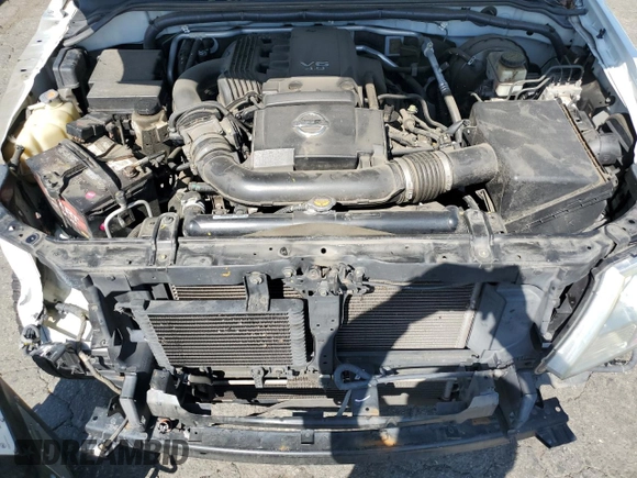 2016 Nissan Frontier SV z VIN 1N6AD0ER3GN742001, wystawiony jako Copart lot #60980695 z przebiegiem 117 716 mil mil oraz Szkoda całkowita • Salvage title. Historia ofert i sprzedaży dostępna na DreamBid. Obrazek 11.