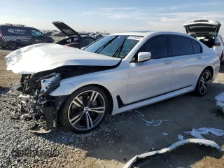 2019 BMW 7 Series 740i with VIN WBA7E2C58KB217951, listed as a Copart auction lot 87125264 with 0 mi miles and Salvage Title. Bid and sale history available at carsss.com. Image 1.
