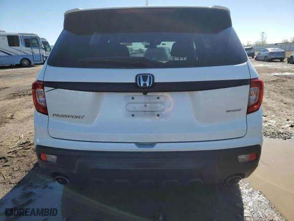 2019 Honda Passport Sport with VIN 5FNYF7H2XKB006389, listed as a Copart auction lot 87490554 with 77,465 mi miles and Salvage Title. Bid and sale history available at carsss.com. Image 6.