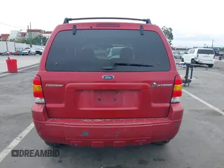2006 Ford Escape Hybrid with VIN 1FMCU96H96KA52738, listed as a IAAI auction lot 41773608 with 214,834 mi miles and . Bid and sale history available at DreamBid. Image 16.