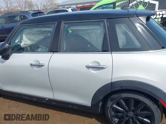 2016 MINI Hardtop 4 Door z VIN WMWXU1C54G2A93779, wystawiony jako IAAI lot #41933339 z przebiegiem 85 000 mil mil oraz . Historia ofert i sprzedaży dostępna na DreamBid. Obrazek 14.