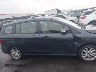2015 Mazda 5 Sport with VIN JM1CW2BL3F0188052, listed as a IAAI auction lot 40777036 with 69,405 mi miles. Bid and sale history available at carsss.com. Image 13.