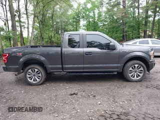 2018 Ford F-150 XL z VIN 1FTEX1EPXJFA67913, wystawiony jako IAAI lot #42264824 z przebiegiem 60 058 mil mil oraz . Historia ofert i sprzedaży dostępna na DreamBid. Obrazek 13.