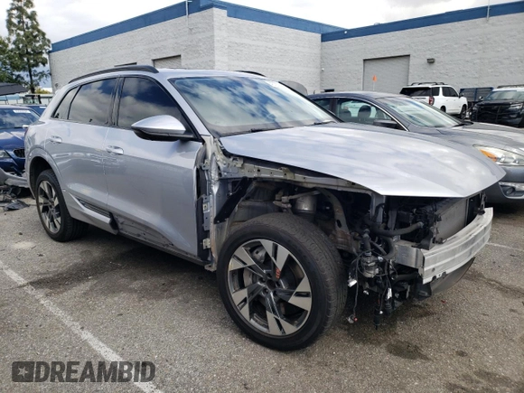 2021 Audi e-tron Premium with VIN WA1AAAGE7MB006939, listed as a Copart auction lot 45187924 with 49,600 mi miles and . Bid and sale history available at DreamBid. Image 4.