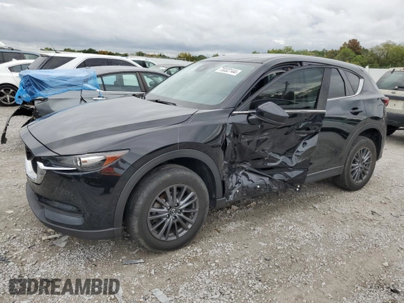 2020 Mazda CX-5 Touring with VIN JM3KFBCM1L0792706, listed as a Copart auction lot 73032144 with 56,845 mi miles and Salvage Title. Bid and sale history available at carsss.com. Image 1.