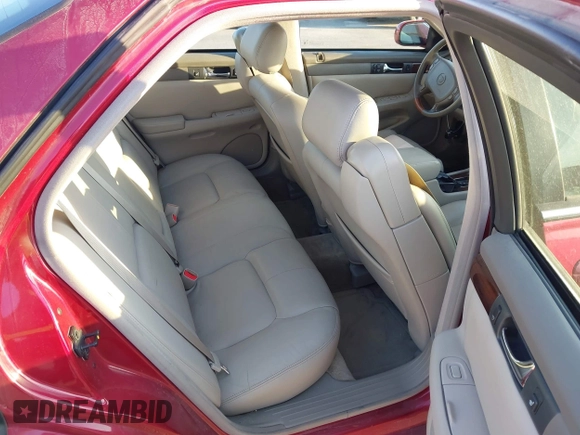 2003 Cadillac Seville Luxury SLS z VIN 1G6KS54Y33U252938, wystawiony jako IAAI lot #41767653 z przebiegiem 145 346 mil mil oraz . Historia ofert i sprzedaży dostępna na DreamBid. Obrazek 8.