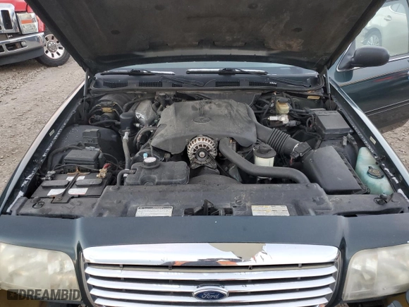 1998 Ford Crown Victoria LX with VIN 2FAFP74W9WX171309, listed as a Copart auction lot 80585734 with 192,162 mi miles and Salvage Title. Bid and sale history available at carsss.com. Image 11.