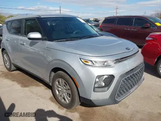 2021 Kia Soul LX with VIN KNDJ23AU5M7779829, listed as a IAAI auction lot 41557514 with 54,623 mi miles. Bid and sale history available at carsss.com. Image 1.
