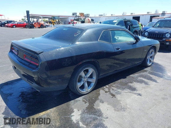 2015 Dodge Challenger R/T with VIN 2C3CDZAT3FH707200, listed as a IAAI auction lot 42154182 with 93,868 mi miles and . Bid and sale history available at DreamBid. Image 4.