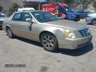 2006 Cadillac DTS 1SD z VIN 1G6KD57Y16U207264, wystawiony jako IAAI lot #42229109 z przebiegiem 74 061 mil mil oraz . Historia ofert i sprzedaży dostępna na DreamBid. Obrazek 1.
