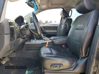 2011 Nissan Titan Pro-4X with VIN 1N6BA0EC6BN313680, listed as a Copart auction lot 60335995 with 241,301 mi miles and Salvage title. Bid and sale history available at DreamBid. Image 7.