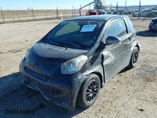 2012 Scion iQ with VIN JTNJJXB07CJ019727, listed as a IAAI auction lot 41428155 with 119,035 mi miles. Bid and sale history available at carsss.com. Image 2.