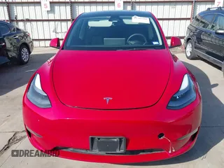 2022 Tesla Model Y Performance z VIN 7SAYGDEF0NF518740, wystawiony jako IAAI lot #41785358 z przebiegiem 50 692 mil mil oraz . Historia ofert i sprzedaży dostępna na DreamBid. Obrazek 13.
