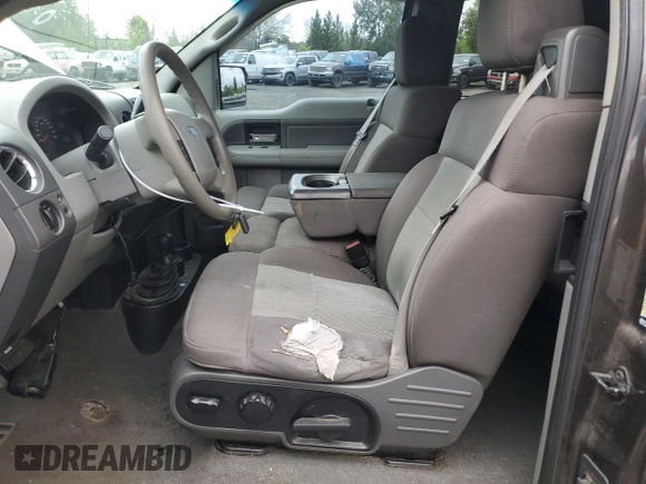 2005 Ford F-150 XLT with VIN 1FTPX14515FB59362, listed as a Copart auction lot 56751995 with 164,390 mi miles and Salvage title. Bid and sale history available at DreamBid. Image 7.