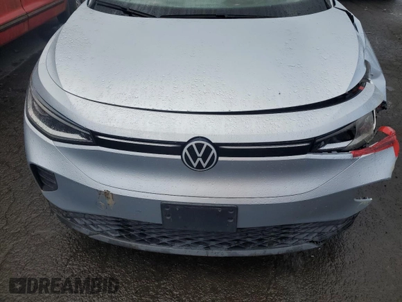 2021 Volkswagen ID.4 Pro S z VIN WVGTMPE25MP028423, wystawiony jako Copart lot #47427535 z przebiegiem Nie podano mil oraz Szkoda całkowita • Salvage title. Historia ofert i sprzedaży dostępna na DreamBid. Obrazek 11.