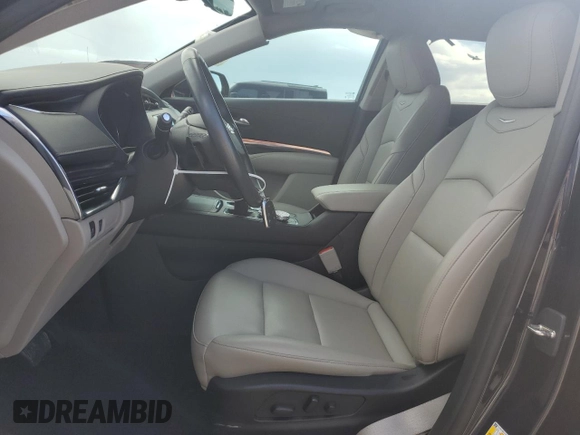 2023 Cadillac XT4 FWD Luxury with VIN 1GYAZAR4XPF104311, listed as a Copart auction lot 46891635 with 28,972 mi miles and Non repairable. Bid and sale history available at DreamBid. Image 7.