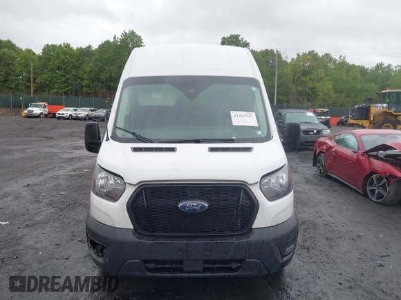 2021 Ford Transit Cargo with VIN 1FTBW1X84MKA98047, listed as a IAAI auction lot 42313747 with 65,600 mi miles and . Bid and sale history available at DreamBid. Image 12.