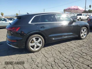 2019 Audi e-tron Premium Plus with VIN WA1LAAGE5KB023079, listed as a Copart auction lot 64977463 with 14,043 mi miles. Bid and sale history available at carsss.com. Image 3.