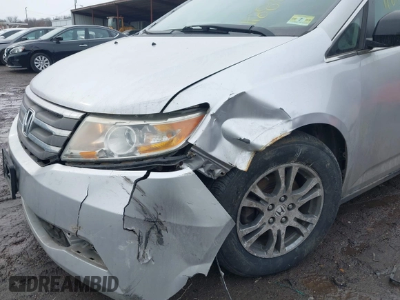 2013 Honda Odyssey EX-L with VIN 5FNRL5H63DB007682, listed as a IAAI auction lot 41408103 with 201,453 mi miles and . Bid and sale history available at carsss.com. Image 6.