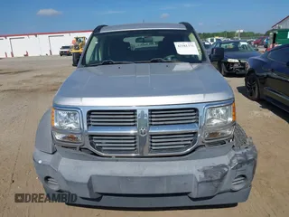 2007 Dodge Nitro SXT z VIN 1D8GT28KX7W562701, wystawiony jako IAAI lot #42181375 z przebiegiem 259 879 mil mil oraz . Historia ofert i sprzedaży dostępna na DreamBid. Obrazek 12.