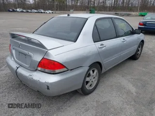 2004 Mitsubishi Lancer LS with VIN JA3AJ36E44U020349, listed as a IAAI auction lot 41714325 with 1 mi miles. Bid and sale history available at carsss.com. Image 4.